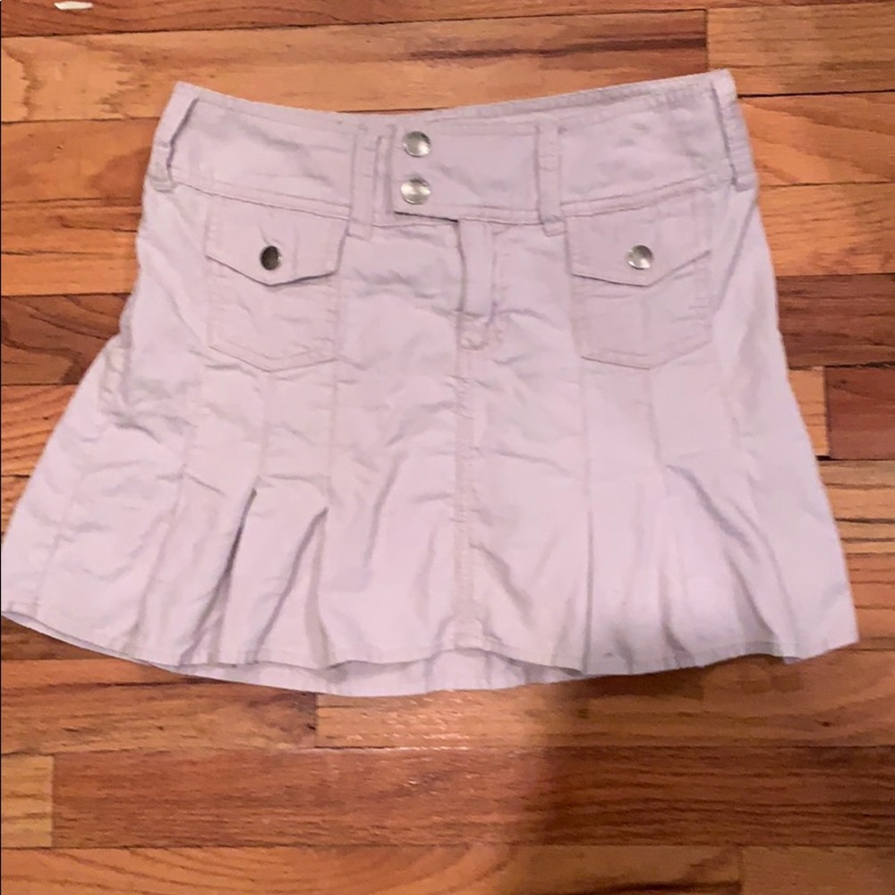 Cream colored corduroy mini pleated skirt